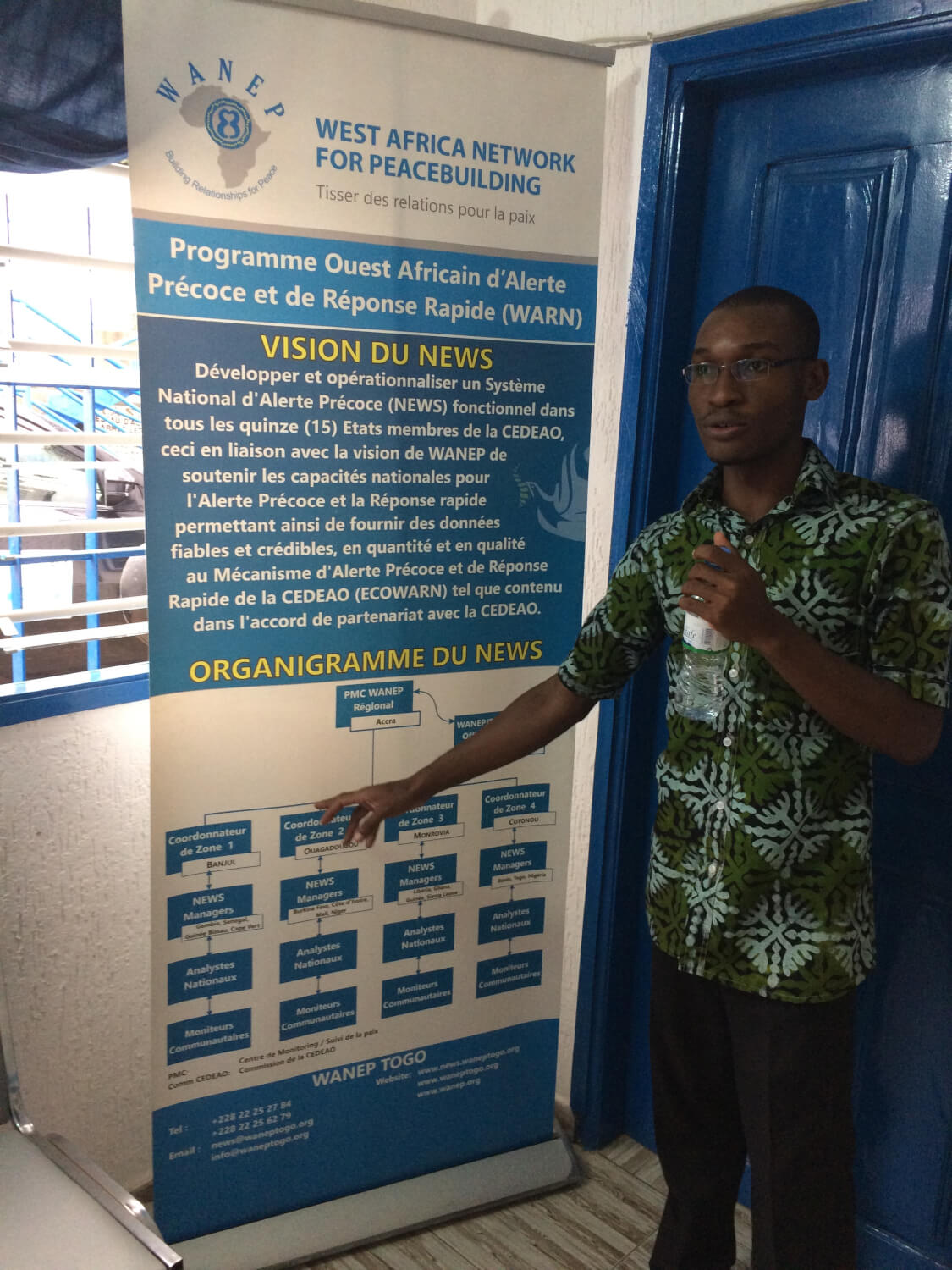 interview participant with poster