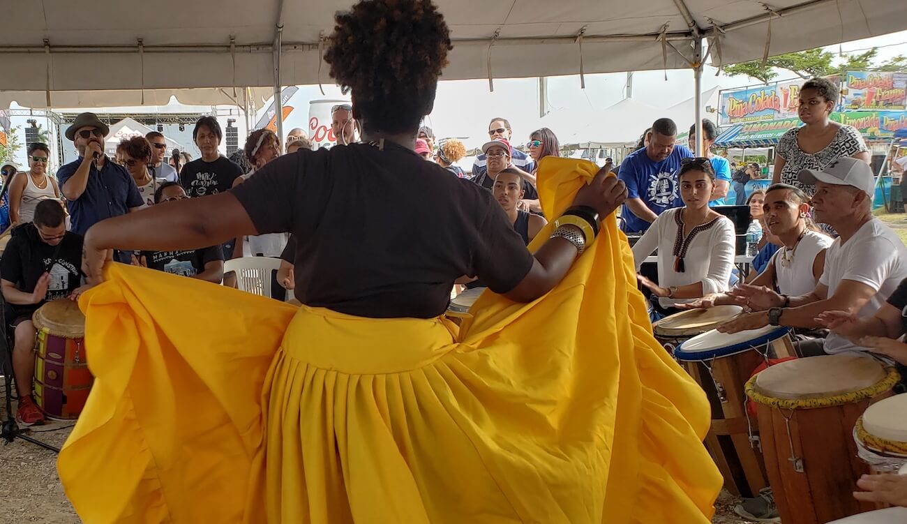 Woman dancing Bomba in Salinas